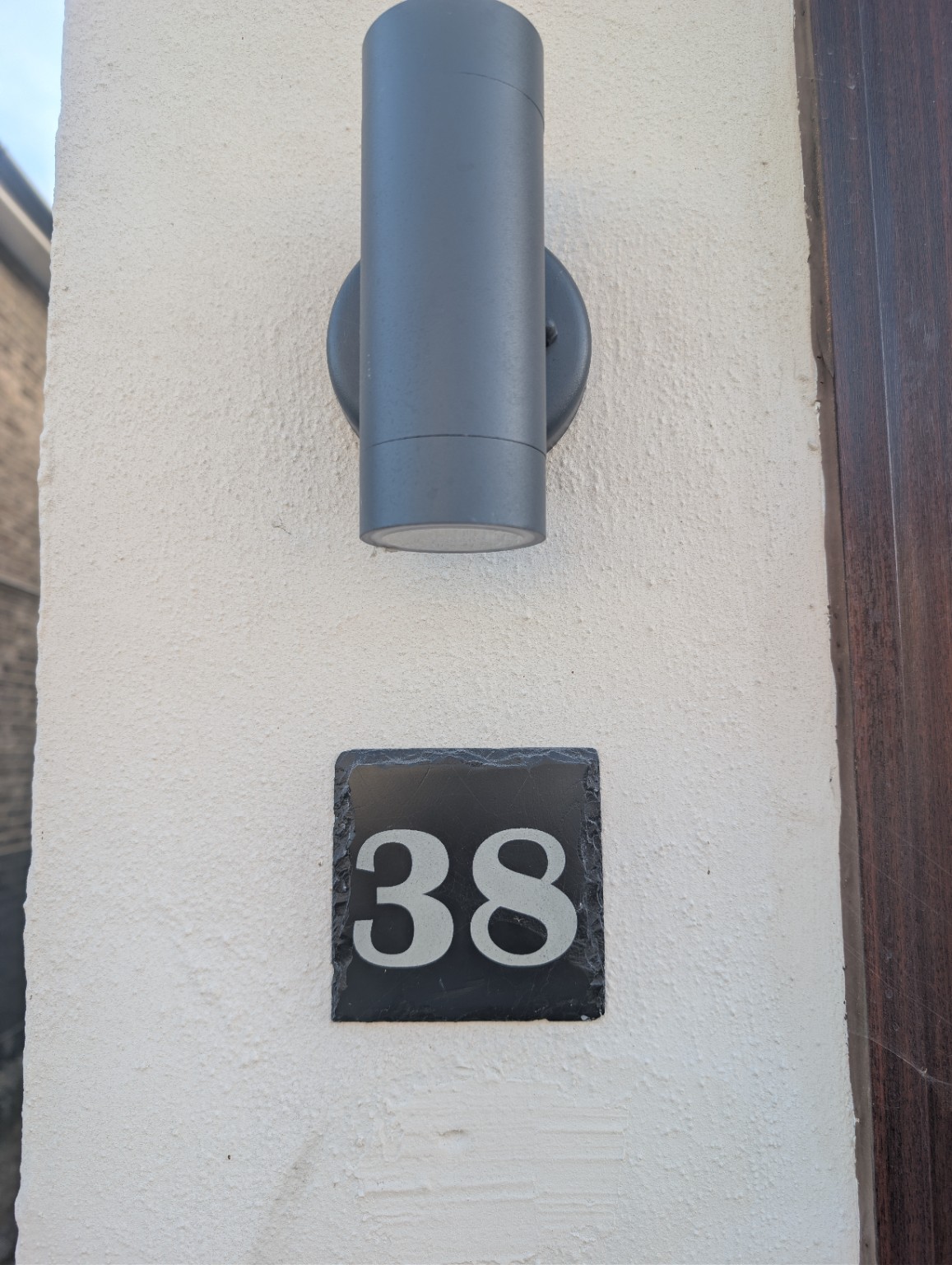 Custom laser-cut house number 38