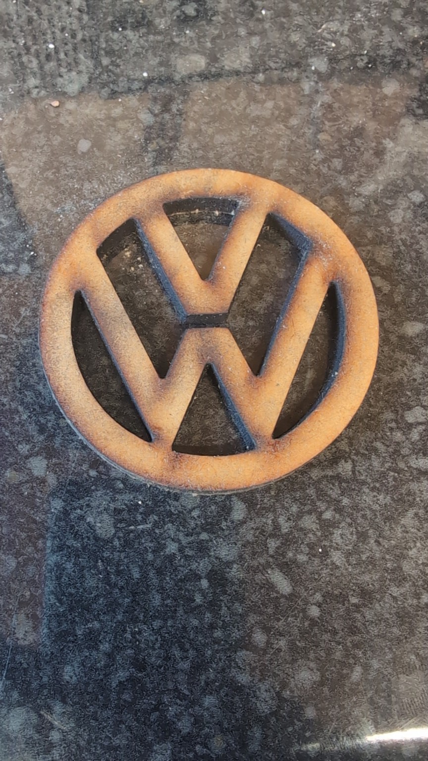 Layered wooden VW emblem